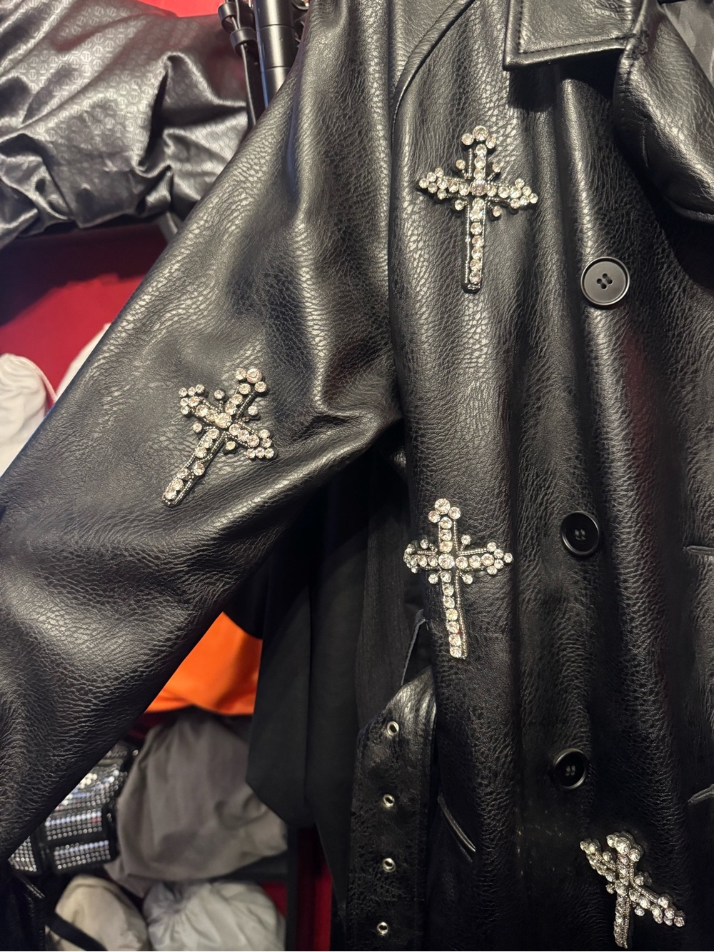 AKIRA Black Faux Leather Trench Coat with Rhinestone Crosses - Picture 2 of 3